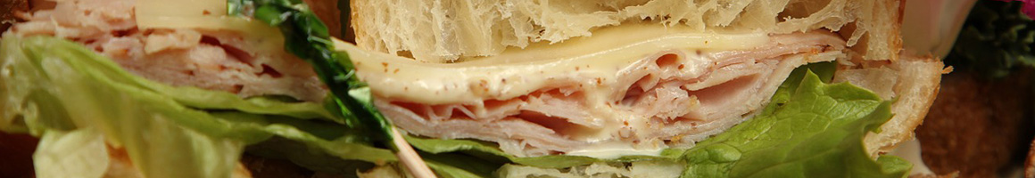 Eating Sandwich at Frazier's Connection restaurant in Marrero, LA.